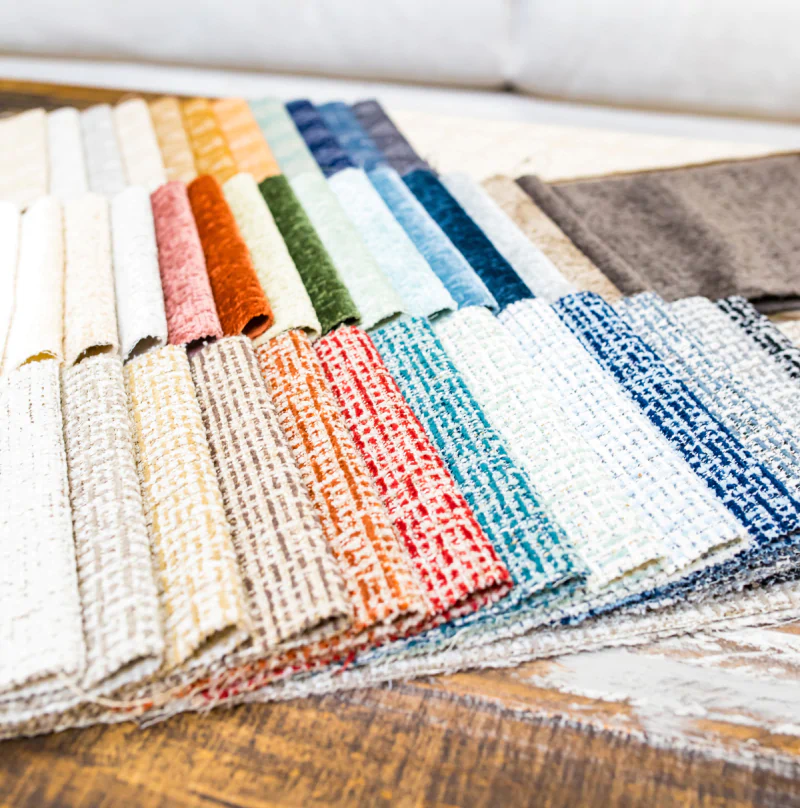 Fabric swatches in various colors and textures.